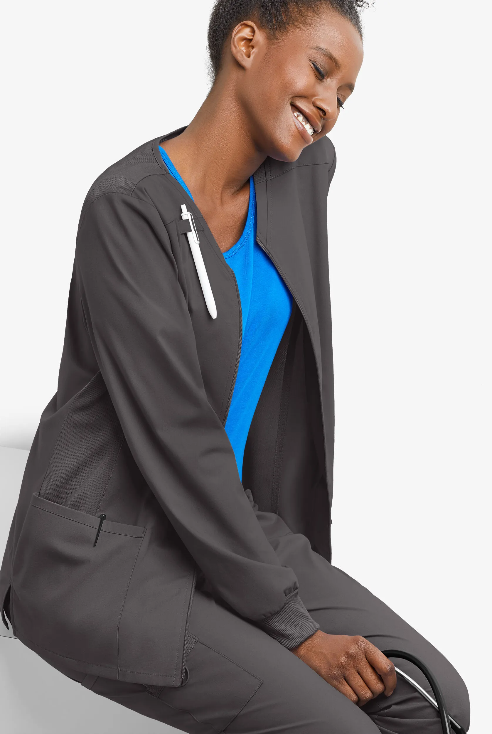 Chaqueta médica Cherokee Workwear Professionals Active STRETCH con cremallera y 4 bolsillos para mujer