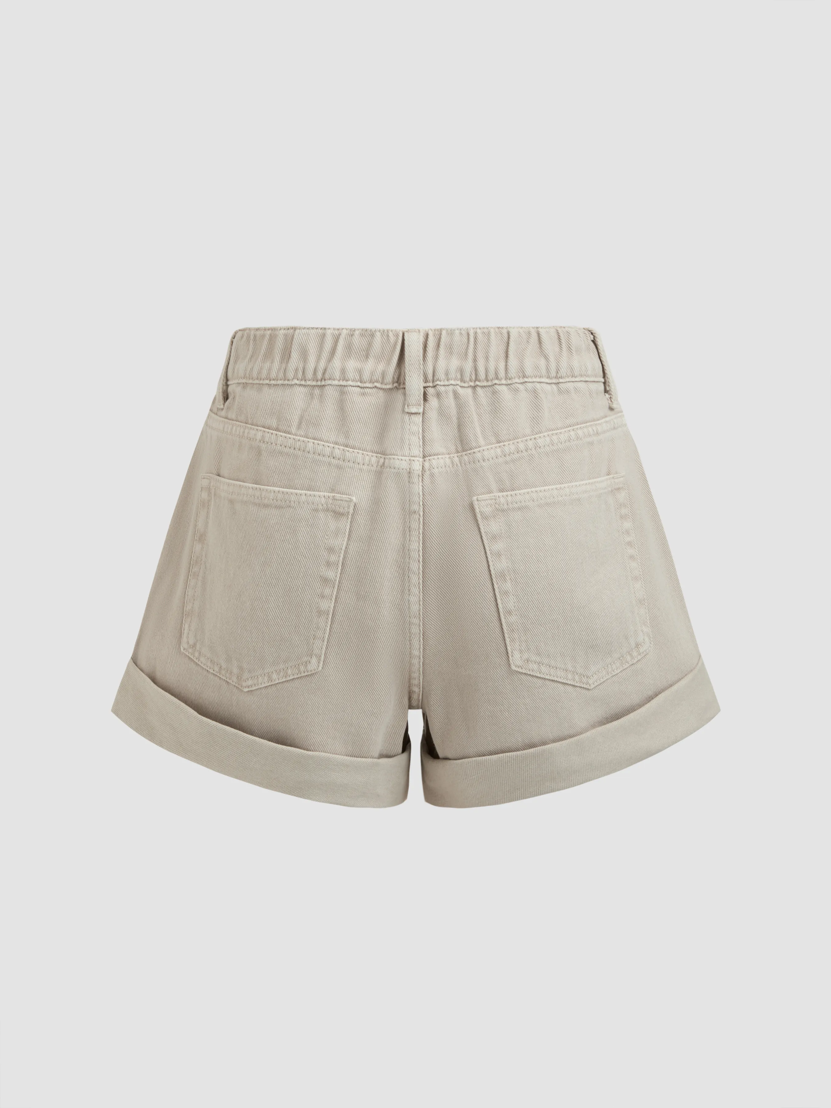 Pantalón corto vaquero de tiro medio y pierna ancha en color liso