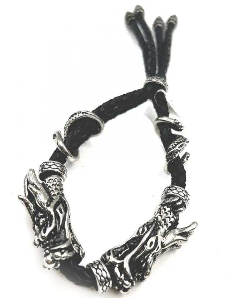 PULSERAS HOMBRE NEGRAS CON ESPECTACULARES DRAGONES DE ACERO