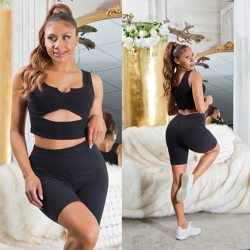 Set biker shorts y top de punto negro