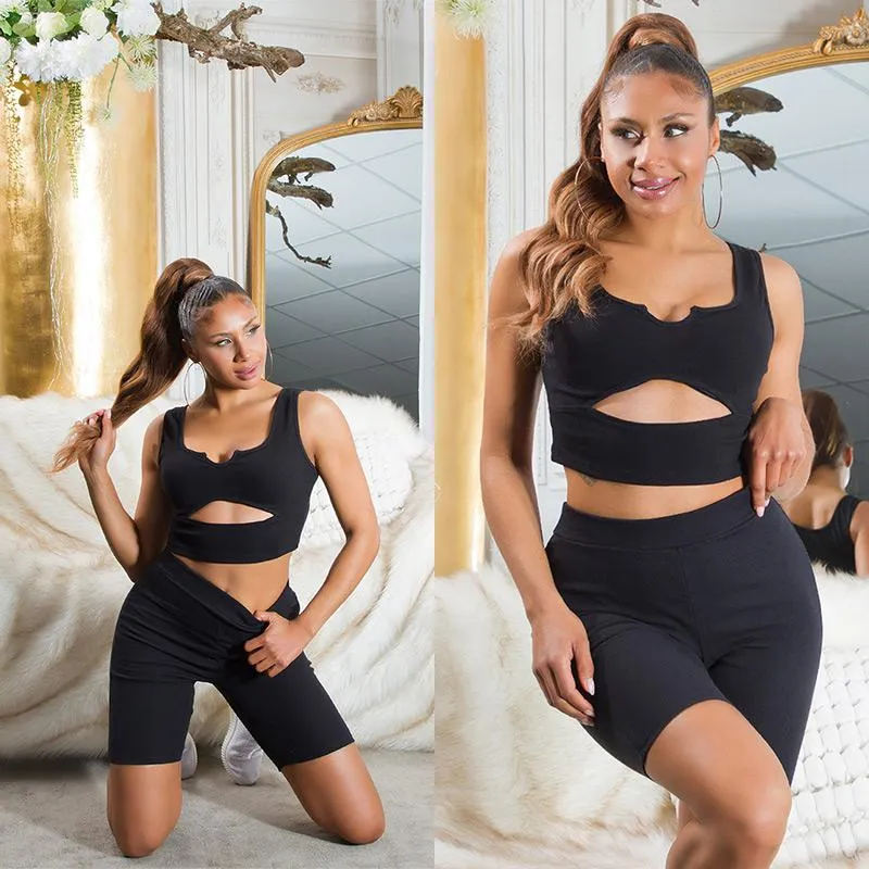 Set biker shorts y top de punto negro